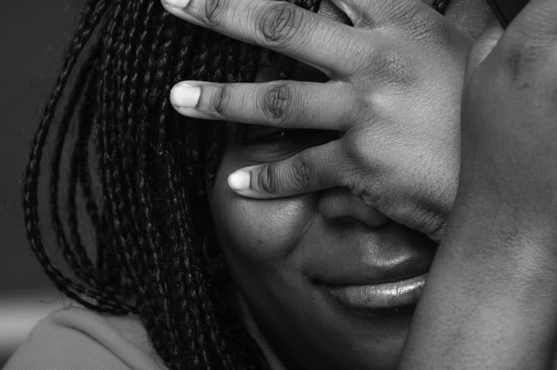 An editorial black-and-white portrait