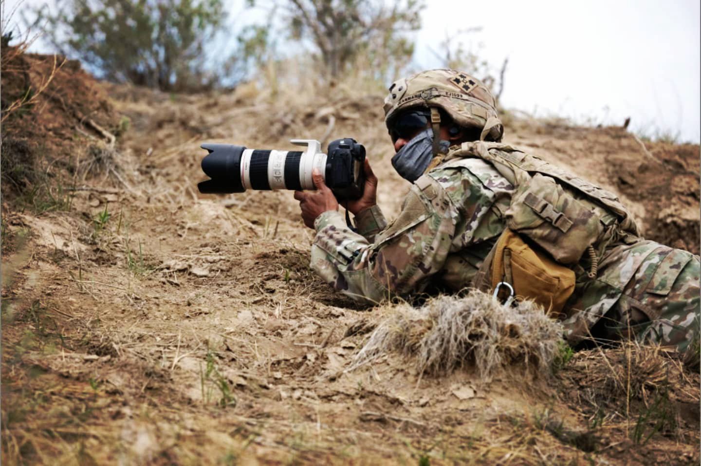 A military photographer in the field
