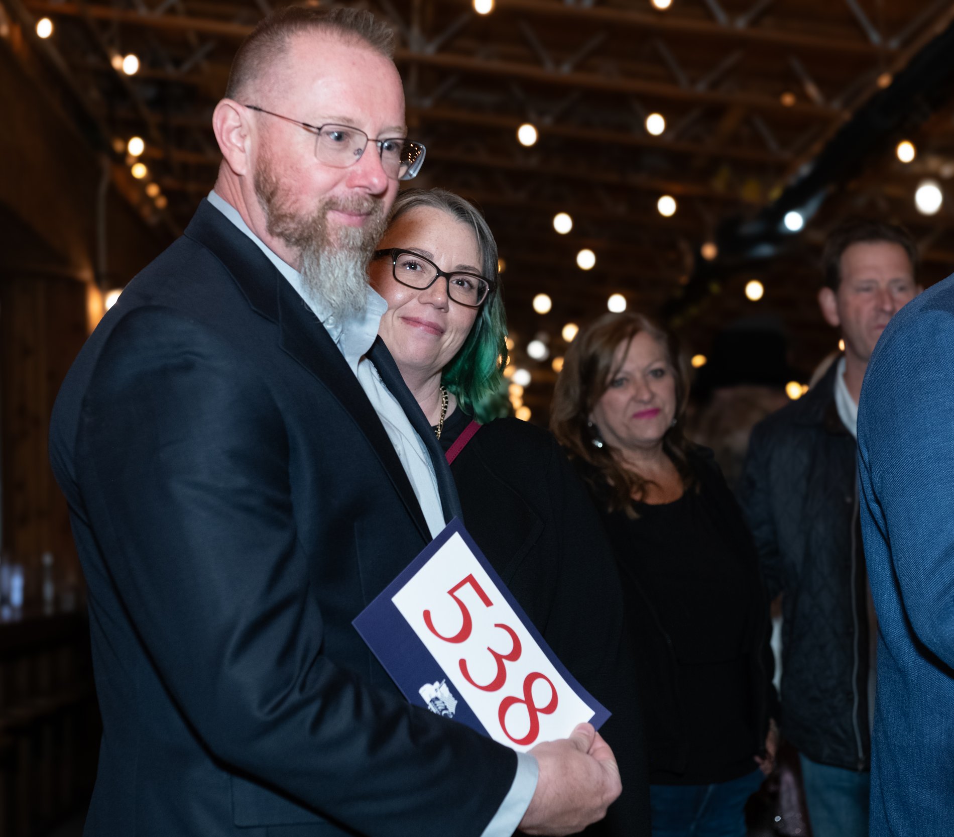 A charity auction gala, paddle raised for the cause, Perfectionshoots Colorado event photography