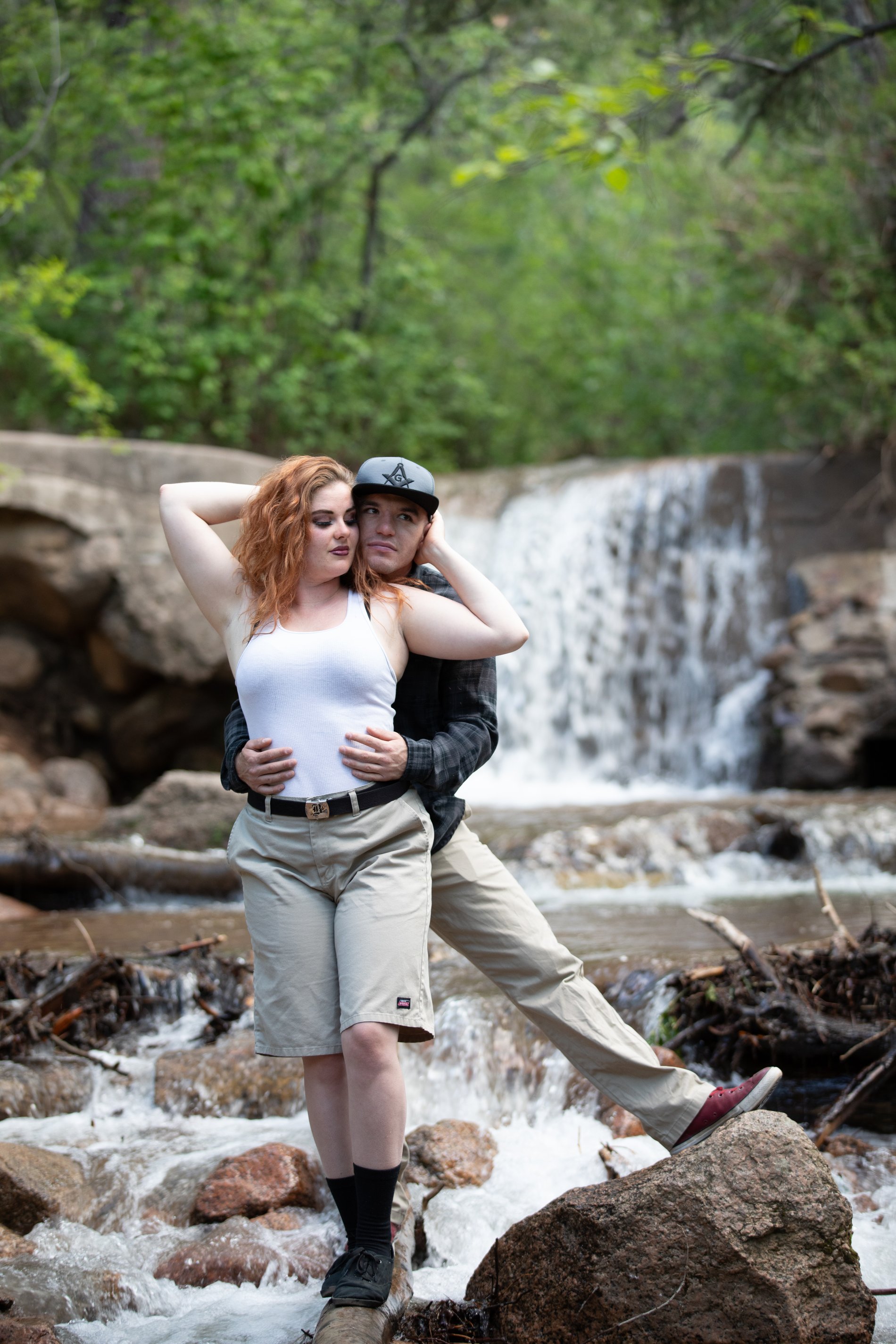 An engagement session at a mountain waterfall, Perfectionshoots Colorado wedding photography