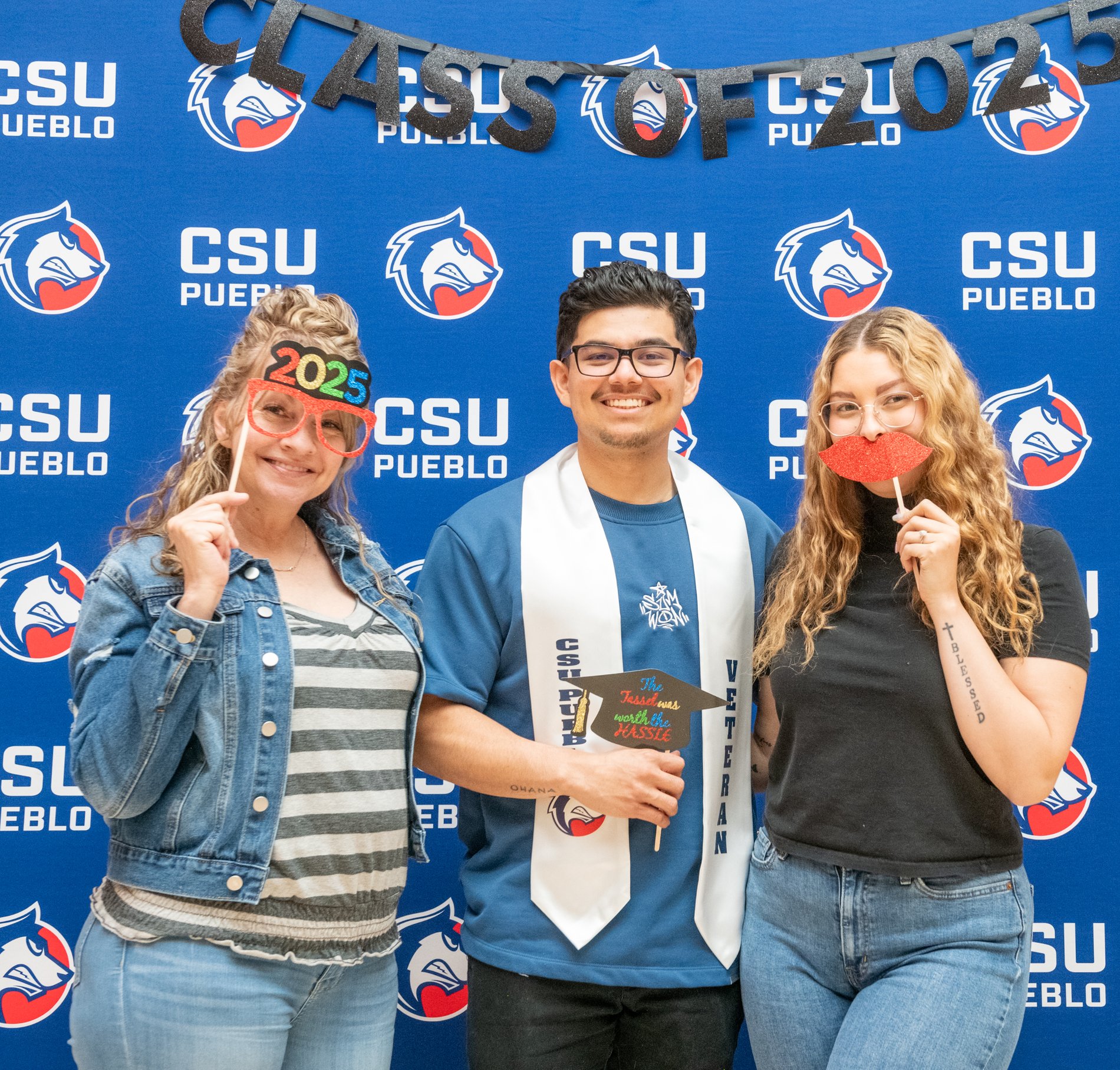 A CSU Pueblo graduate with family