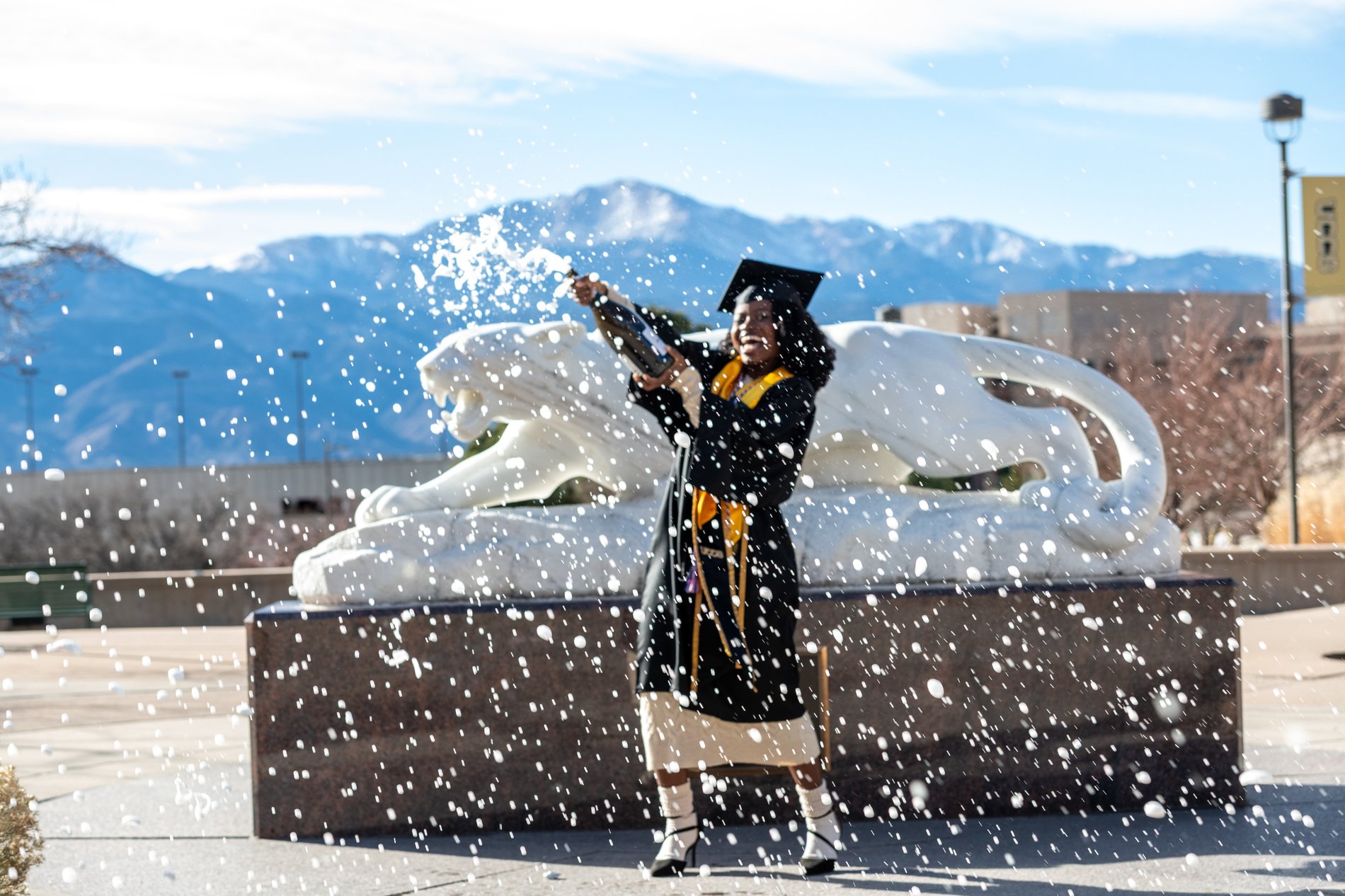 A champagne celebration beneath Pikes Peak, UCCS graduation