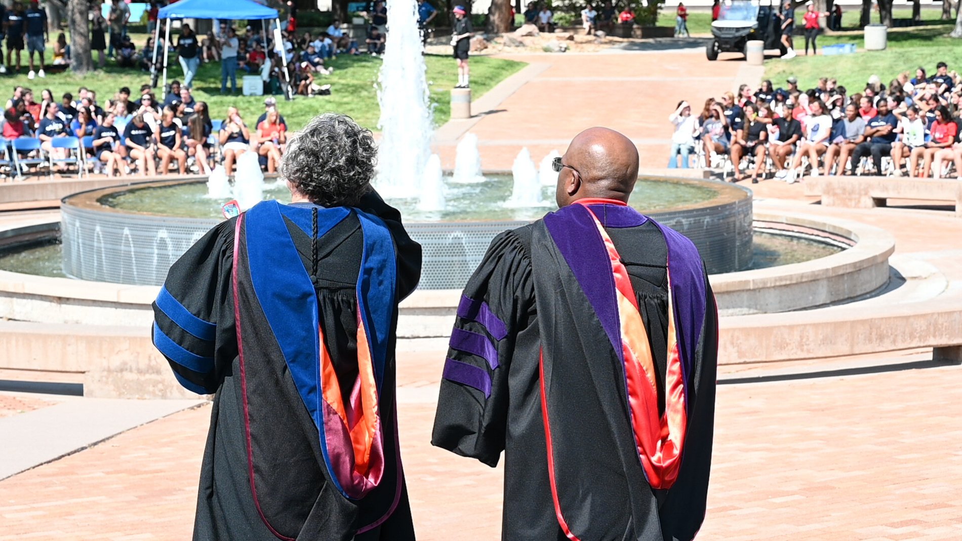 Faculty in regalia at commencement, Perfectionshoots university event photography