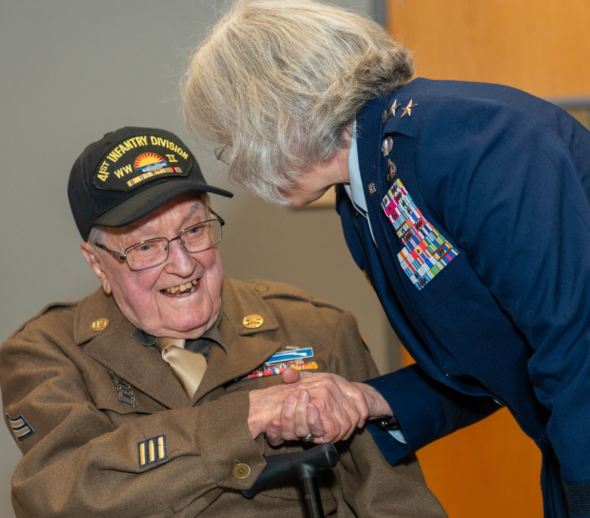 A WWII veteran honored by a general officer, Perfectionshoots military and veteran event photography