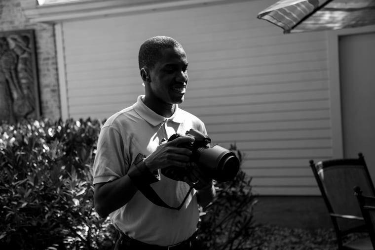 Emmanuel Jeanmarie at work, camera in hand, Perfectionshoots, Colorado visual legacy studio