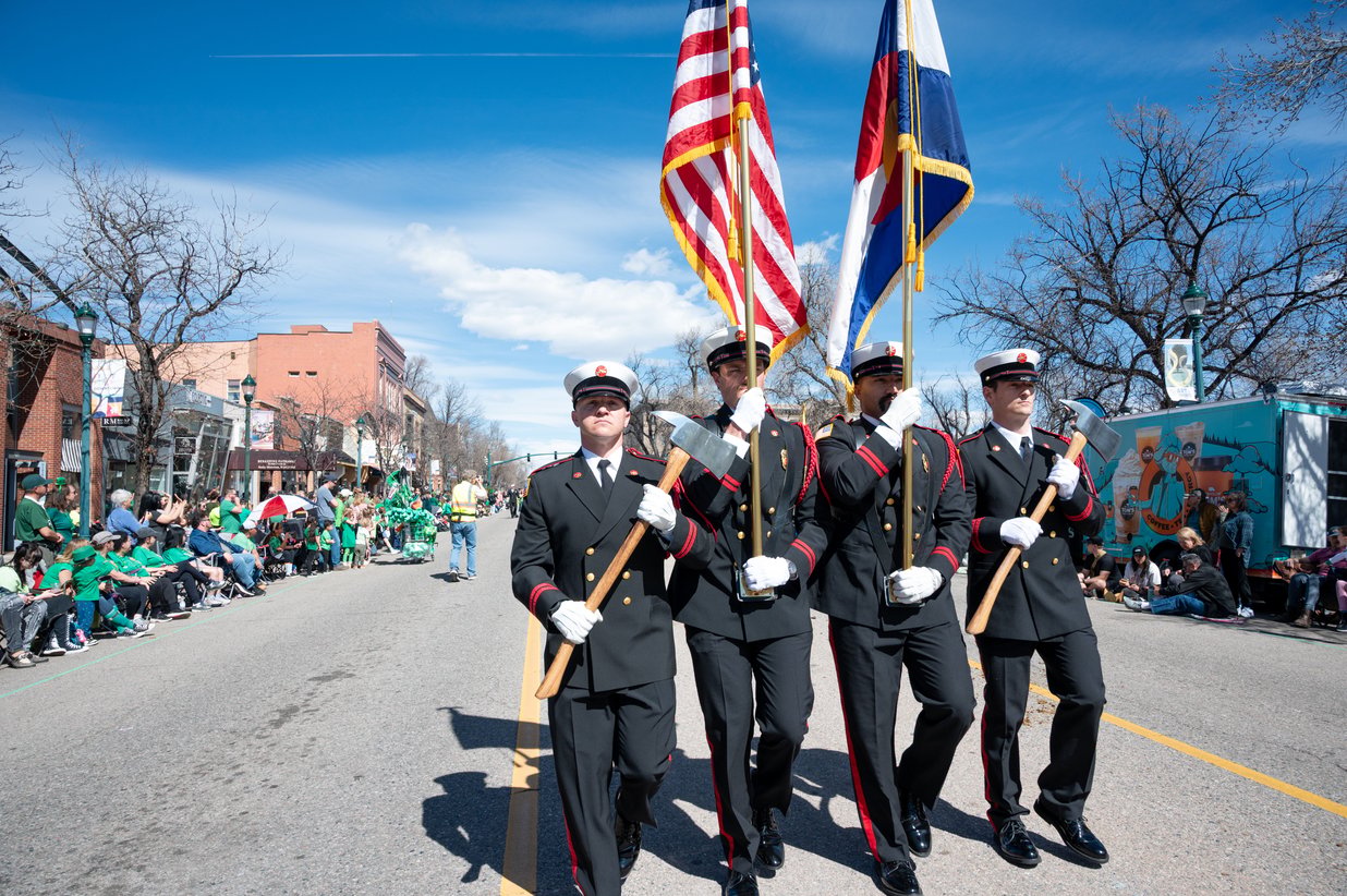 A color guard leads the parade, Perfectionshoots military and veteran event photography