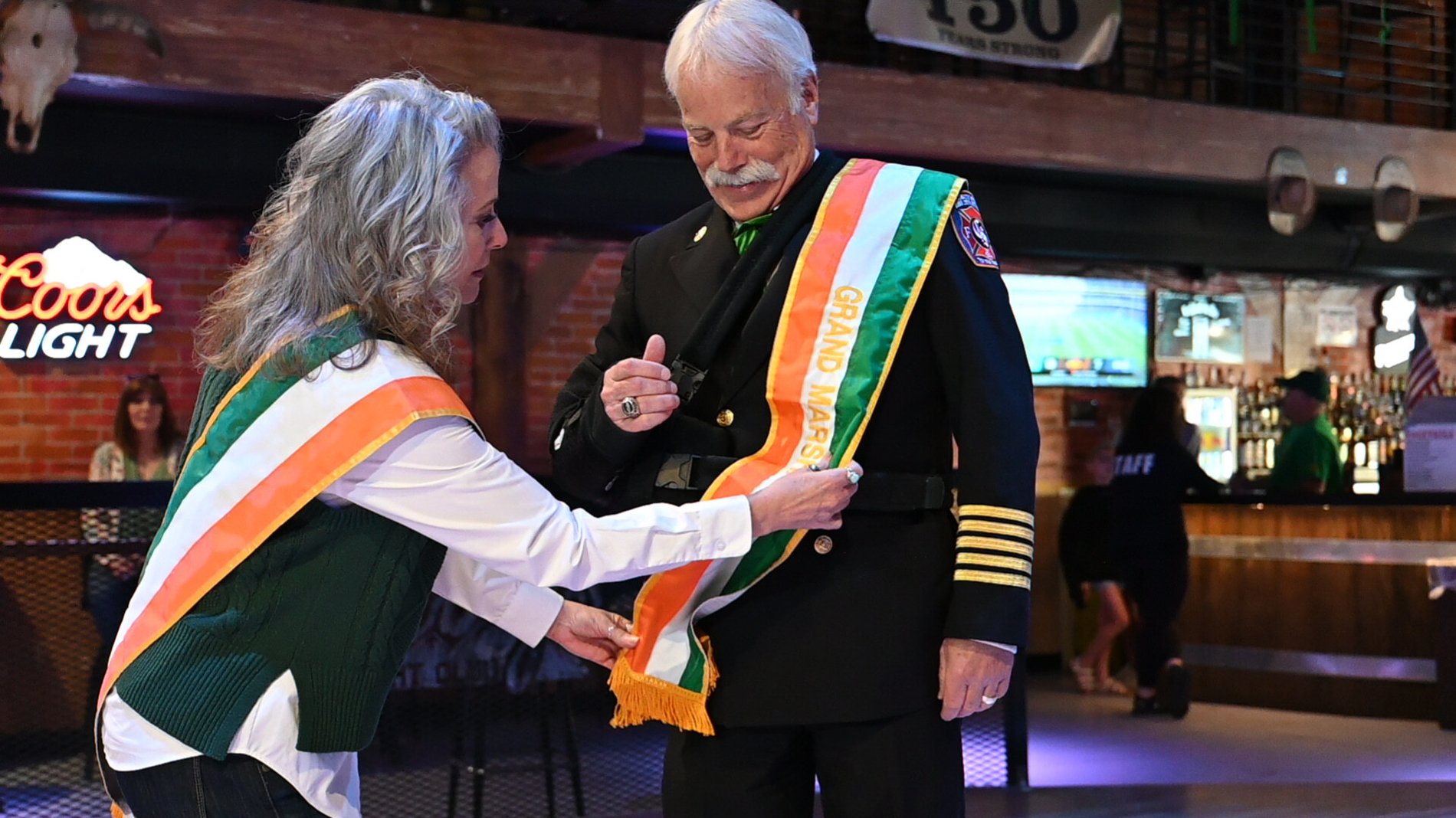 A Grand Marshal sash moment at the St. Patrick's celebration, Perfectionshoots Colorado event photography