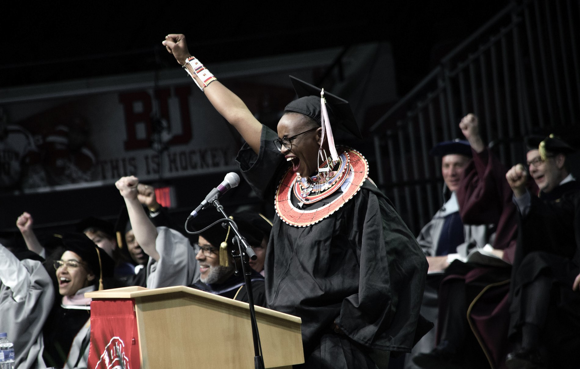A graduate celebrating at commencement, Perfectionshoots university event photography
