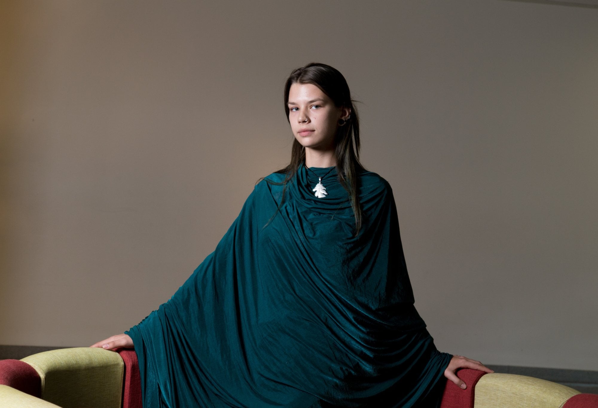 An editorial portrait in deep teal, Perfectionshoots Colorado portrait photography